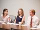 Undergraduates smile during the presentations