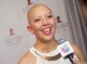 A teenage St. Jude patient on the step and repeat