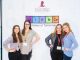 Students pose after the symposium in front of the Science Scholars step and repeat.