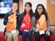 Science Scholars attendees smiling with their symposium gifts.