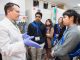 Students participating in a break out session in a St. Jude lab.