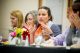 A woman adds to the discussion during the meeting