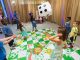 Patient siblings playing a giant board game
