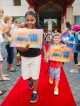 Patient siblings Syniah Porterfield and Braden Davis walking the red carpet