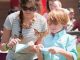 mom and son releasing butterflies