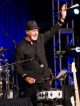 Danny Seraphine waves at the audience.