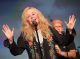 Kim Carnes sings on stage.
