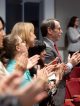 James R. Downing, MD, and staff stand and clap for the graduates.