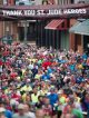 Crowd running down Beale Street.
