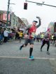 Man running down Beale Street.