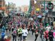 People running down Beale Street.
