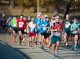 Marathon and half marathon runners make their way down North Parkway.