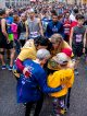 A team prays in a huddle before the race.