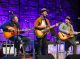 Rodney Clawson, Kristian Bush, and another male performer on stage.