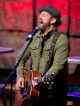 Kristian Bush playing the guitar.