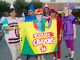 A group of runners dressed as crayons