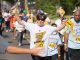 A runner waving flags.