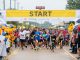 People begin running the race.