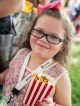 Zoe enjoys a snack during the event.