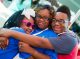 Lisa shares a moment with her children, JaKayla and Javon, during the event.