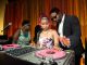 A teen deejays with DJ Irie.