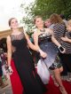 Two girls walking the red carpet.