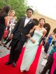 A young couple walking the red carpet.