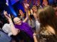 Girls dancing at the teen prom.