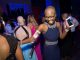 A young girl dances at the teen prom.