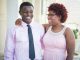 Prom couple posing for picture