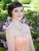 Girl in prom dress smiling