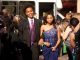 Prom couple walking the red carpet into the event