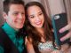 Prom couple taking a selfie