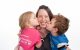patient Josiah with his mom and sister