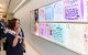 Dr. Glenda Newell-Harris of The Links, Inc., looks at The ABCs of Cancer wall at St. Jude.