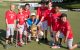 Honorary pin flag caddies and St. Jude patients (from left) Calvin, Bridget, Allyson, Reid, Bailey, Quincy and Dakota stand with 2019 World Golf Championships - FedEx St. Jude Invitational champion Brooks Koepka.