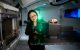 Li Zhao, PhD, performs an equipment test in the proton therapy center.
