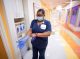 Woman putting on PPE
