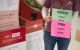 Sign held by woman.