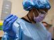 Nurses test employees in the Marlo Thomas Center Auditorium.