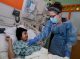 Leah Gross, RN, Inpatient Units, cares for a patient.