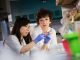 Martine Roussel, PhD, in lab with researcher