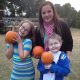 St. Jude patient Tyler in a Luigi costume with his family during Halloween