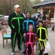St. Jude patient Tyler in a Luigi costume with his family during Halloween