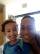 Candid photo of St. Jude patient Carlos with his mom