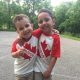 Patient Lucas with his brother in matching Canada shirts