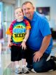 Male patient Matthew Fulcher posing with dad in hospital hallway