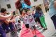 Young boy walks down the red carpet at Siblings' Day