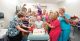 Confetti falls and employees sing as a St. Jude patient celebrates her last chemotherapy treatment.