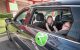 Josh, Jennifer, and Bella get into a Zipcar.